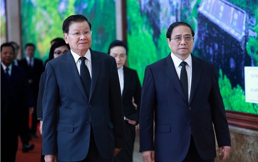 PM Chinh greets Lao Party General Secretary and President